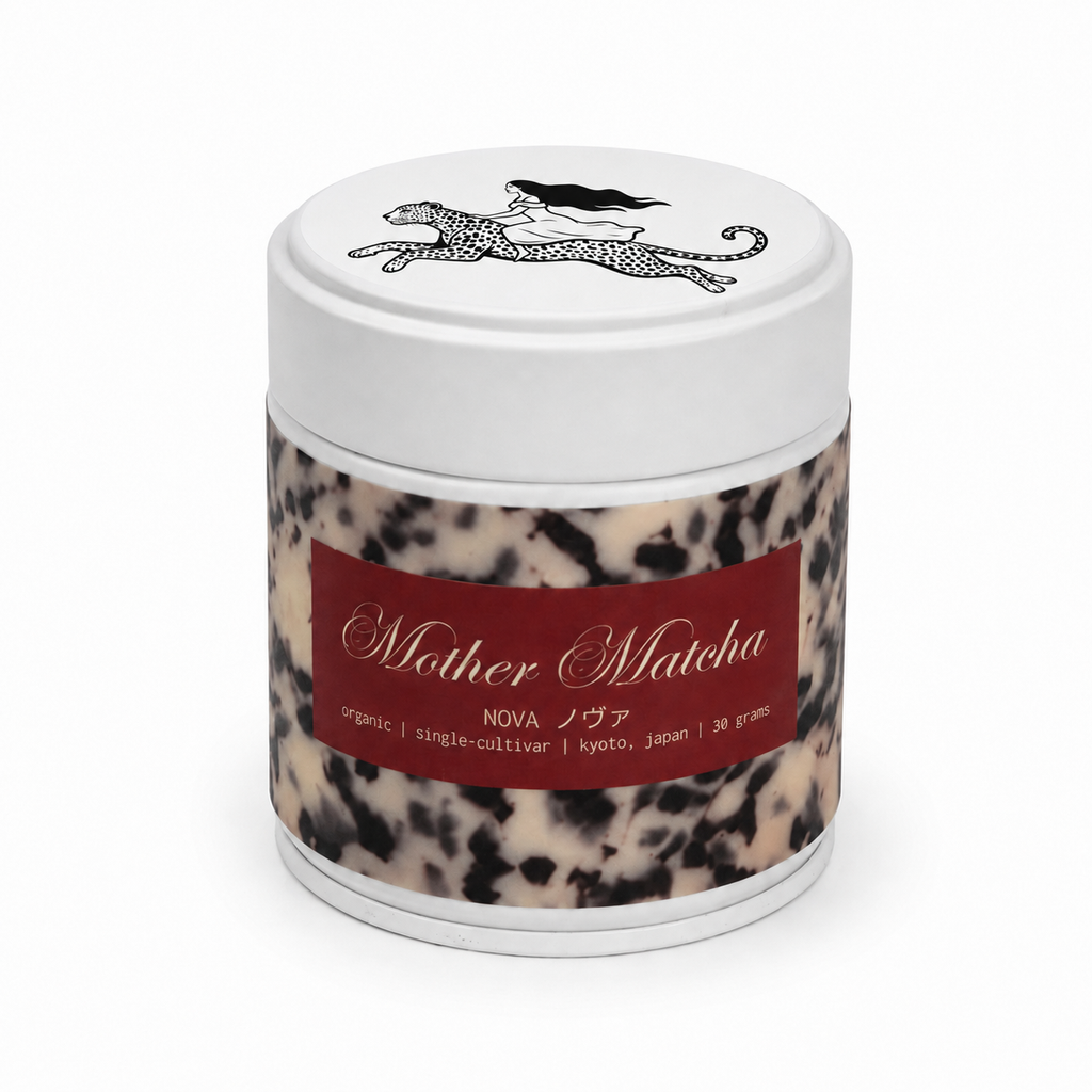 30g tin of mother matcha with a white lid, cream and black tortoise shell wrap, red label